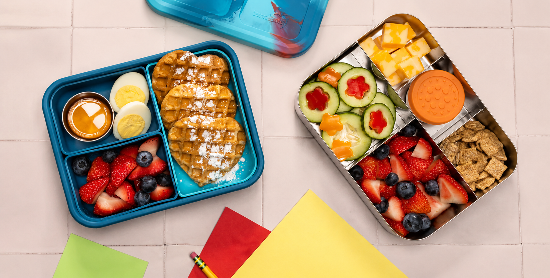Bento box with sandwich, berries and nuts